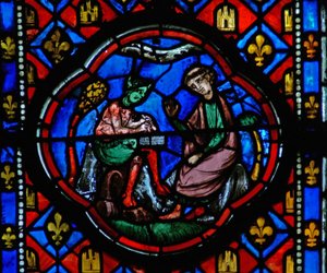 Window Ew-R depicting a scene from the Theophilus story: he signs a pact with the devil by French School