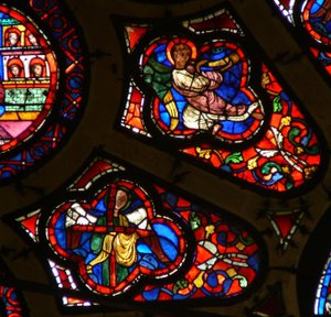 Window depicting an angel with a Passion Instrument - the Cross and an angel with a trumpet at Last Judgement by French School