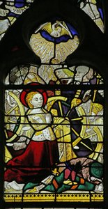 Window depicting St Catherine praying and Angels breaking the wheel by throwing stones by French School