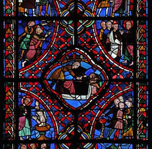 Window depicting the third section of the St James window: not all of the scenes have been identified, but a baptism can be seen and possibly the martyrdom of the saint by French School