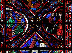Window depicting scenes from the legend of St John, including the saint and the poisoned cup