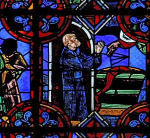 Window depicting the miracle of the full wine barrel at the foundation of St Julien
