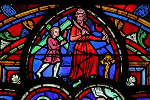 Window depicting Abraham with Isaac carrying wood by French School