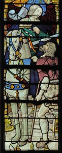 Window depicting the Charity of St Martin: he divides his cloak