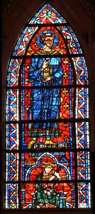 Window depicting St Protais - below a king kills himself