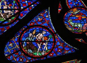 Window w115 depicting Adam delves while Eve spins by French School
