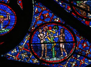 Window w115 depicting the Adam and Eve story: the Serpent beguiles by French School