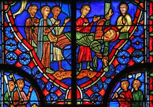 Window w11 depicting St Andrew bound to his cross and preaches to the crowd by French School