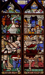 Window depicting St Vincent crushed under a press; he dies