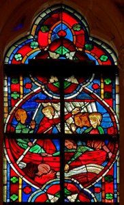 Window depicting a scene from a legend of St Nicholas: a devil gives travellers a liquid but the flask is lost overboard by French School