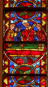 Window w213 depicting scenes from the life of St Stephen and the story of his relics: he is buried by Gamaliel and Nicodemus by French School