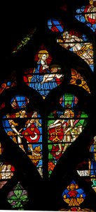 Tracery lights with angels carrying shields of arms by French School