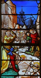 Window w23 depicting St Crepin and St Crepinian: thrown into the river Aisne with millstones around their necks
