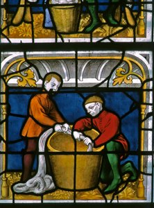 Window w25 depicting a draper at work in the Drapers window by French School