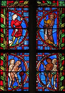 Window w30 depicting God with Adam carrying a spade; Adam and Eve try to hide their nakedness by French School