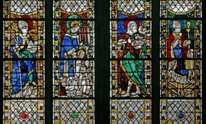Window depicting St Eloi, St Laurence, St John the Baptist and St Nicholas