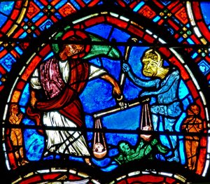 Window depicting a scene from the Last Judgement: St Michael weighing the souls by French School
