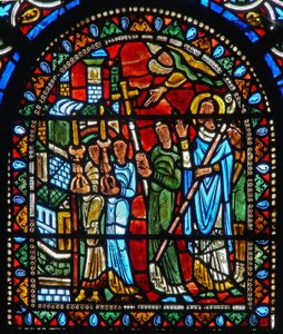 Window wXXI depicting a procession with a saint by French School