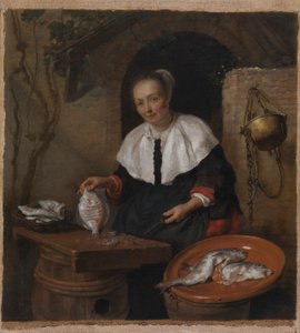 Woman Cleaning Fish