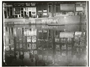 Reflection of Canal Houses in the Water at Singel 377 to 385 in Amsterdam by George Hendrik Breitner
