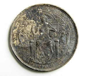 Trial cast for a coin