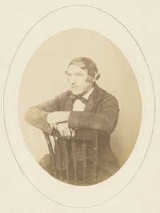 Portrait of Man Seated on Chair