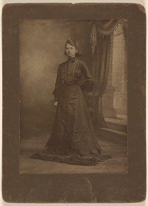 Portrait of a Young Woman in Long Black Dress, Standing by George W. Killian
