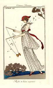 Woman in dress of printed linen playing diabolo