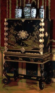 Decorated cabinet on stand, attributed to Gerard Dagly, Berlin lacquer master renowned as an Oriental copyist, c.1700