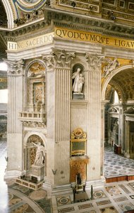 Decorations on first pillar on right, one of four pillars supporting dome of St Peter