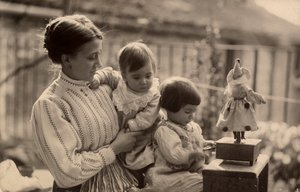 Woman with Babies and Doll