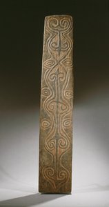 Rectangular New Guinea shield, decorated with carved scrolls in relief, the back with six carved lugs to hold rattan loops, April River