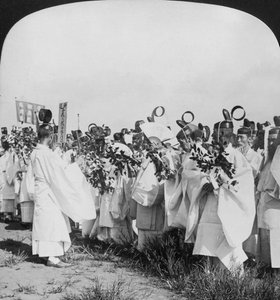 Shinto priests in a funeral procession for Hitachi Maru victims, Tokyo, Japan