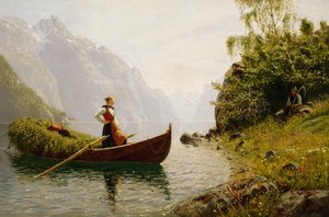 Woman and man in fjord landscape