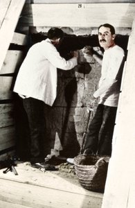 Howard Carter and a colleague excavating a tomb in the Valley of the Kings, Egypt by Harry Burton