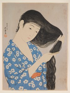 Woman Combing Her Hair