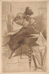 Woman looking at prints in a print stand
