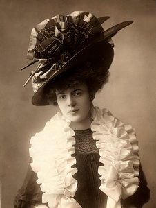 Close-up of a young woman in clothes from the beginning of the 20th century by Henri Manuel