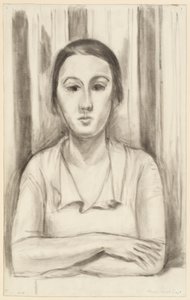 A Woman Leaning with Elbows on a Table