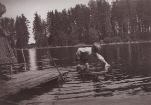 Children Floating a Toy Ship at Niemenlautta by Hugo Simberg