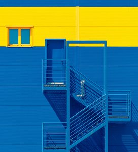 Bold Blue Yellow Facade by Igor Bakotic