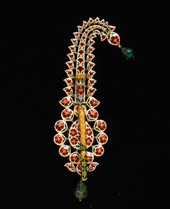 An antique Indian diamond, ruby, emerald and enamel jigha