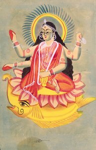 Laksmi sitting on a throne of lotus leaves