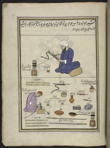 Men covering hookah-snakes with thread and wire