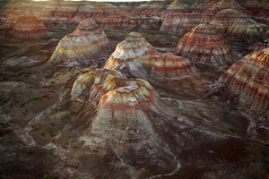 Colored rocks near Wu Cai Wan in the Gobi desert, Xinjiang, Western China by Ira Block