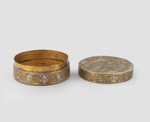 Box with cover of cylindrical form, of engraved brass inlaid with silver, with later gilding and possible addition of inner band, 1400-c.1525