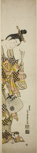 A Courtesan Holding a Lantern and a Fan by Ishikawa Toyonobu