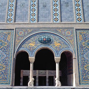 One of the aivans with tiled revetments, grille and monolithic stone columns by Islamic School