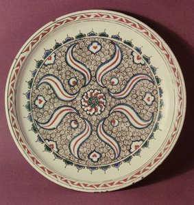 Plate decorated with a flame pattern, Iznik, from Turkey by Islamic School