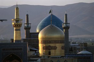 The all-gold dome and minaret of the shrine of Imam Reza, with the Timurid Gowhar Shad Mosque behind by Islamic School